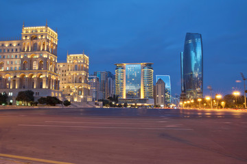 Fototapeta na wymiar Azerbaijan, Baku at night Azadlig Square in front of the Government House evening side. Platitude Freedom - Azadlig located on the shores of the Caspian Sea.Hotel Absheron Marriott . Neftchiler Avenue