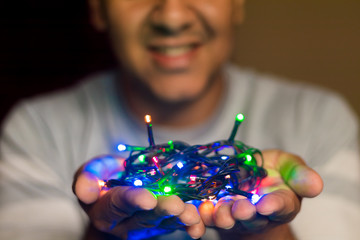 Man with christmas lights