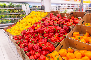 Bright fresh vegetables on the counter in the supermarket