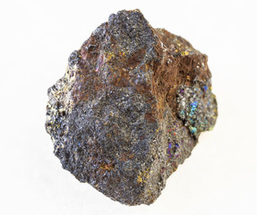 raw magnetite (iron ore) stone on white