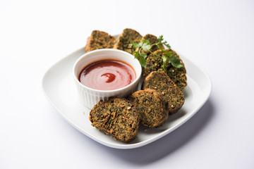 Cilantro cake or Kothimbir Vadi is a popular maharashtrian cuisine made with cilantro leaves....