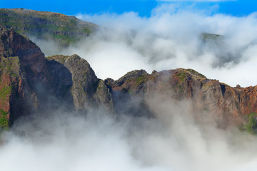 Mountain range in dense clouds. View from Pico do Arieiro on Portuguese island of Madeira