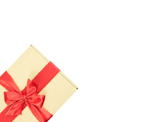Gift box and red ribbon with copy space on isolated white background.