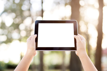 Woman holding digital tablet