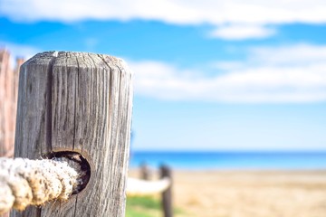Rope fence on a beach in Ibiza, Spain.
