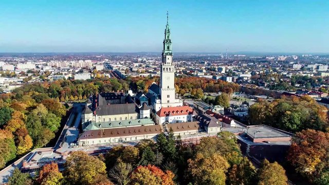 Poland, Częstochowa. Jasna G&oacute;ra fortified monastery and church on the hill. Famous historic place and Polish Catholic pilgrimage site with Black Madonna miraculous icon. Aerial 4K reveal video in fall