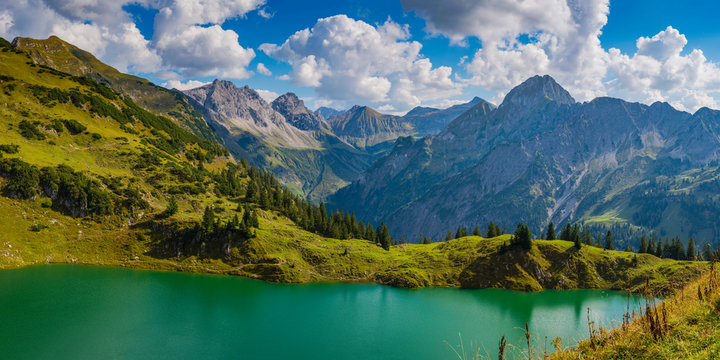 Germany, Bavaria, Allgaeu Alps, Panoramic view to Seealpsee, Oy Valley, f.l. Grosser Wilder, Kleiner Wilder and Hoefats
