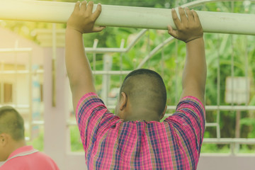 Fototapeta premium Students move a goal during a training football session in scho