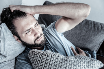 Portrait of serious man that having bad mood