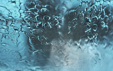 Rain falling on a window pane