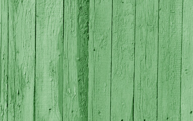 Fototapeta na wymiar Old wooden wall in green color.