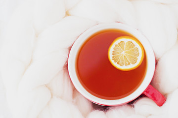 Having a cup of tea in bed - cozy breakfest at home