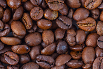 Roasted brown coffee beans pattern, background, top view