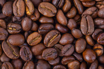 Roasted brown coffee beans pattern, background, top view