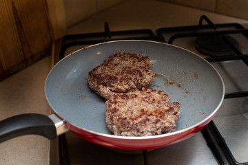 burgers on pan