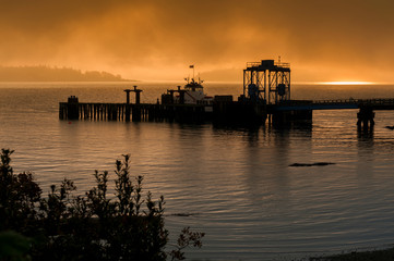Fototapeta na wymiar Puget Sound Ferry Boat on a Foggy Morning. The 