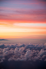 Beautiful Cloudscape Photo Colorful Sunset Sky at Dusk from the Top of Haleakala Volcano in Maui...