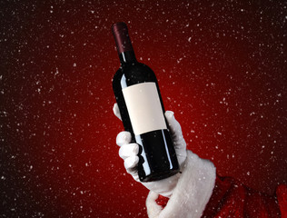 Santa Holding Wine Bottle with Snow Effect
