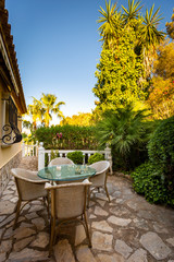 The dining room in classical style, light furniture, marble, luxury.