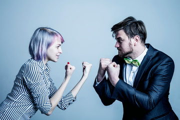 Man against woman get angry and fight. Aggression, negative emotions concept.