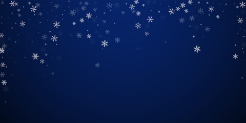 Sparse snowfall Christmas background. Subtle flyin