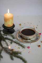 christmas still life with candle and decorations