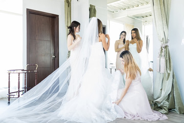 Naklejka premium Beautiful Bride Getting Ready For Wedding