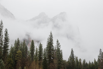 Foggy Three Sisters mountain formation in Yosemite National Park, California