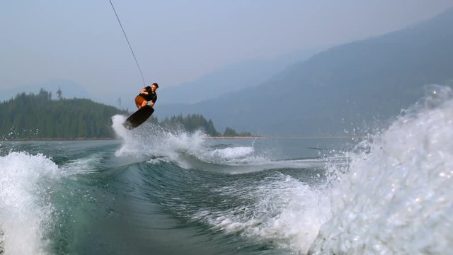 Man wakeboarding in the river 4k