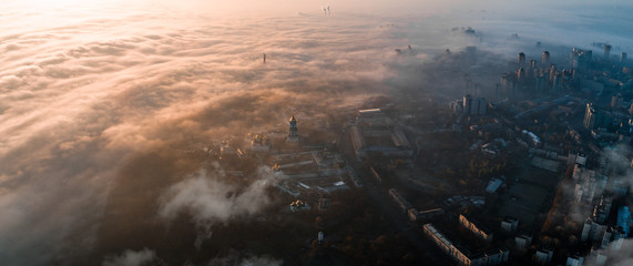Aerial view of the city in dense fog