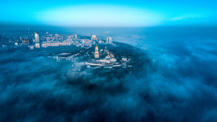 Aerial view of the right bank of Kiev covered with thick fog