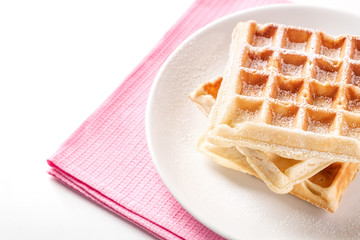 belgian waffles with icing sugar