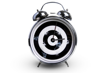 alarm clock in the form of a target as a symbol of time killed