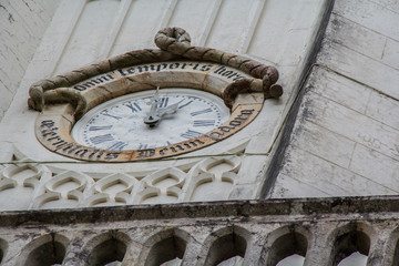 clock on wall of church