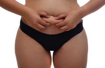 Overweight woman hand pinching excessive fat on white background, Healthy concept