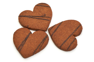 Christmas Ginger and Honey cookies with chocolate, isolated on a white background. Close-up.