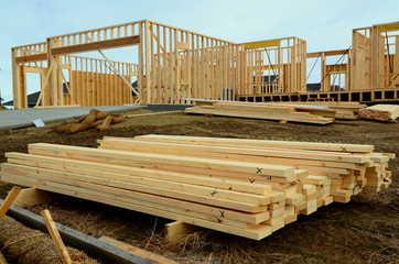 Wood frame residential building under construction.