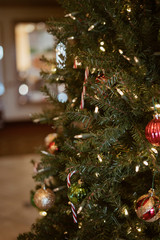 Green Christmas Tree with cozy ornaments