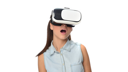 Young woman in virtual reality (VR) glasses holding tablet. Isolated on white background
