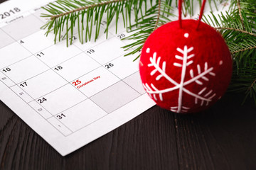 25 date on calendar with Red mark. Save the date. Christmas holiday preparation concept