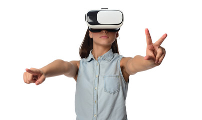  Young woman in virtual reality (VR) glasses holding tablet. Isolated on white background