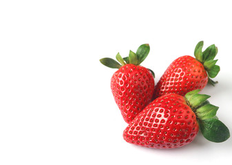 Three Bright Color Red Fresh Ripe Strawberries Isolated on White Background with Free Space for Design or Text 