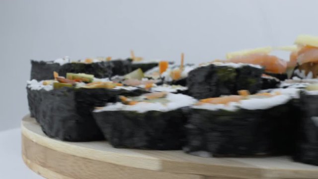 Side View Of Suchi Board Spinning Close Up Shot