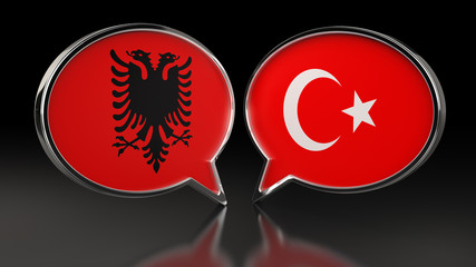 Albania and Turkey flags with Speech Bubbles. 3D illustration