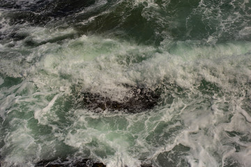 Waves during a storm. View from above. Red code. Rest on the Black Sea coast in Bulgaria. Elemental...