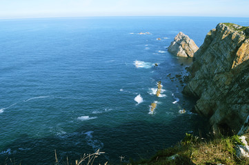 Amazing panorama of the Cantabrian Sea and palaeozoic rock formations from the Cabo de Penas in Asturias, Spain