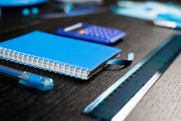 School and office supplies on office table. Male or boyish still life on the topic of school, study, office work.