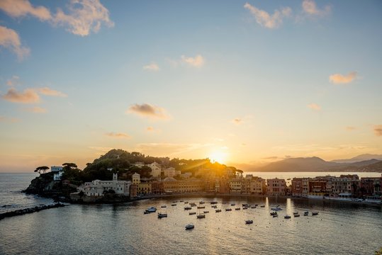 View of the village with harbour in the bay Baia del Silenzio at sunset, Sestri Levante, province Genoa, Riveria di Levante, Liguria, Italy, Europe