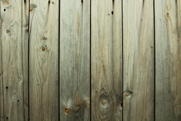 Fototapeta premium Old wooden unpainted boards. Vertical view. Close-up. Background. Texture.