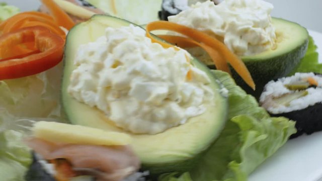 Stuffed Avocadoes, Suchi and Salad Toast Spinning Close Up Shot